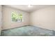 Bedroom featuring a window providing natural light at 600 Community Ln, Lancaster, SC 29720