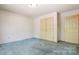Bedroom with carpet and closet at 600 Community Ln, Lancaster, SC 29720
