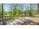 Exterior view of deck overlooking wooded lot at 600 Community Ln, Lancaster, SC 29720
