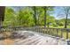Exterior view of deck overlooking wooded lot at 600 Community Ln, Lancaster, SC 29720