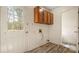 Laundry room with storage cabinets and convenient access to the outside at 600 Community Ln, Lancaster, SC 29720