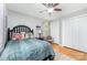 Comfortable bedroom with hardwood floors, neutral decor, and a ceiling fan at 608 Grace St, Shelby, NC 28150