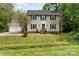 Charming two-story home with traditional design, a well-manicured lawn and an attached two car garage at 608 Grace St, Shelby, NC 28150