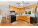 Functional kitchen with light wood cabinets, and an efficient layout at 608 Grace St, Shelby, NC 28150