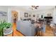 Living room featuring hardwood floors, comfortable seating, and an open floor plan into dining room at 608 Grace St, Shelby, NC 28150