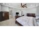Spacious bedroom with tray ceiling offers plenty of room and dark wood furnishings at 610 Blaise Ct, Matthews, NC 28104