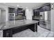 Kitchen with granite countertops, stainless steel appliances, and tiled flooring at 610 Blaise Ct, Matthews, NC 28104