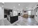 Open concept living and kitchen area with modern finishes and lots of natural light at 610 Blaise Ct, Matthews, NC 28104