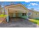 Exterior view highlighting the carport, and stylish design elements at 612 Rowan Mill Rd, Salisbury, NC 28147