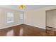Bright room with hardwood floors, natural light, and neutral wall color at 612 Rowan Mill Rd, Salisbury, NC 28147