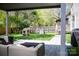 Outdoor living space featuring backyard, covered patio, seating, and playground at 6718 Rollingridge Dr, Charlotte, NC 28211