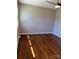 A bright bedroom featuring hardwood floors, neutral paint, and a modern ceiling fan at 736 Lawndale Cir, Fort Lawn, SC 29714