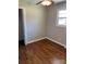 Bedroom with hardwood floors, ceiling fan, closet, and window for natural light at 736 Lawndale Cir, Fort Lawn, SC 29714
