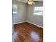Bedroom featuring hardwood floors, ceiling fan, and natural light from the windows at 736 Lawndale Cir, Fort Lawn, SC 29714