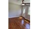 A cozy living room with hardwood floors and a white front door with leaded glass at 736 Lawndale Cir, Fort Lawn, SC 29714