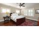 Inviting bedroom features hardwood floors, neutral walls, and large windows offering plenty of natural light at 801 Berkeley Ave, Charlotte, NC 28203