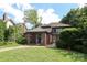 Well-maintained home with beautiful lawn, covered porch, and mature landscaping at 801 Berkeley Ave, Charlotte, NC 28203