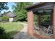 Inviting covered front porch with a swing, perfect for relaxing and enjoying the outdoors at 801 Berkeley Ave, Charlotte, NC 28203
