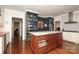Gourmet kitchen with ample storage, marble island, stainless appliances, and designer finishes at 801 Berkeley Ave, Charlotte, NC 28203