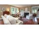 Cozy living room with fireplace, hardwood floors, and comfortable seating arrangement at 801 Berkeley Ave, Charlotte, NC 28203