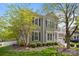 Well-maintained two-story home with manicured lawn and mature trees at 801 Celbridge Ct, Charlotte, NC 28270