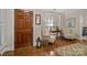 Inviting foyer featuring hardwood floors and stylish furnishings at 801 Celbridge Ct, Charlotte, NC 28270