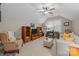 Relaxing room with a comfy sofa, chair, and a desk for work or hobbies at 801 Celbridge Ct, Charlotte, NC 28270