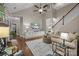 Spacious living room with high ceilings, hardwood floors, and lots of natural light at 801 Celbridge Ct, Charlotte, NC 28270