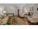 Cozy living room showcasing natural light, stylish rug, and comfortable seating arrangement at 801 Celbridge Ct, Charlotte, NC 28270
