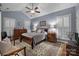 Serene main bedroom with vaulted ceilings, natural light, and elegant furnishings at 801 Celbridge Ct, Charlotte, NC 28270