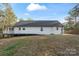 Exterior view of the house showing the deck and backyard at 902 Cornelius Rd, Mooresville, NC 28117