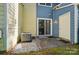 Exterior view of back patio and AC unit at 9036 Four Mile Creek Rd, Charlotte, NC 28277