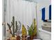 Bathroom featuring a decorative shower curtain, and blue and white towel at 9036 Four Mile Creek Rd, Charlotte, NC 28277