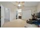 View of bedroom featuring a work area, adjoining bathroom and double closets at 9036 Four Mile Creek Rd, Charlotte, NC 28277