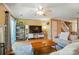 Inviting living room with a ceiling fan, hardwood floors, and a sliding glass door to the outside at 9036 Four Mile Creek Rd, Charlotte, NC 28277