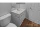 A well-maintained bathroom with clean fixtures, a vanity with a sink, and a practical, bright space at 9930 Birch Knoll Ct, Charlotte, NC 28213
