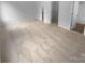 Large bedroom boasts neutral carpet and multiple closets for storage at 9930 Birch Knoll Ct, Charlotte, NC 28213