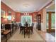 Elegant dining room featuring beautiful chandelier, hardwood floors and ample natural light at 104 Hallmark Xing, Rock Hill, SC 29732