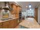 Gourmet kitchen with stainless steel appliances, custom counters, and decorative backsplash at 104 Hallmark Xing, Rock Hill, SC 29732
