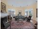 Bright living room with fireplace, hardwood floors, and ample seating area at 104 Hallmark Xing, Rock Hill, SC 29732