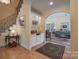 Charming living room with hardwood floors, built-in bar, and staircase at 104 Hallmark Xing, Rock Hill, SC 29732
