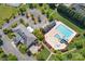 Overhead view of the community pool, splash pad, and clubhouse showcasing the neighborhood's luxurious amenities at 104 Hallmark Xing, Rock Hill, SC 29732
