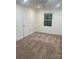 Spacious bedroom with cozy neutral carpet and a bright window view at 109 Barrett Rd, Cherryville, NC 28021