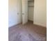 Bedroom featuring spacious closet with ample storage and neutral carpeting at 109 Barrett Rd, Cherryville, NC 28021