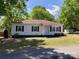 Charming single-story home with blue door, tidy lawn, and traditional curb appeal at 109 Barrett Rd, Cherryville, NC 28021