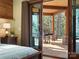 Bedroom with patio access leading to an outdoor seating area at 111 Milledge Dr, Mooresville, NC 28117