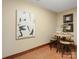 Elegant game room with a round table, stools, and stylish artwork, providing a sophisticated space for entertainment at 111 Milledge Dr, Mooresville, NC 28117