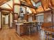 Well-appointed kitchen with ample counter space, a wine rack, and an island with seating at 111 Milledge Dr, Mooresville, NC 28117