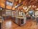 Spacious kitchen featuring custom cabinetry, granite countertops, and stainless steel appliances at 111 Milledge Dr, Mooresville, NC 28117
