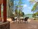 Outdoor patio with a fire pit, lake views, and comfortable seating at 111 Milledge Dr, Mooresville, NC 28117